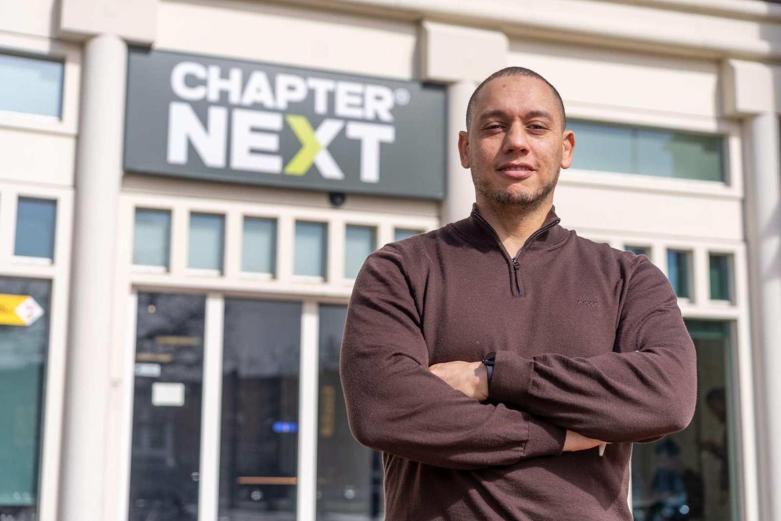 ChapterNext aan de gevel van het pand in Schiedam